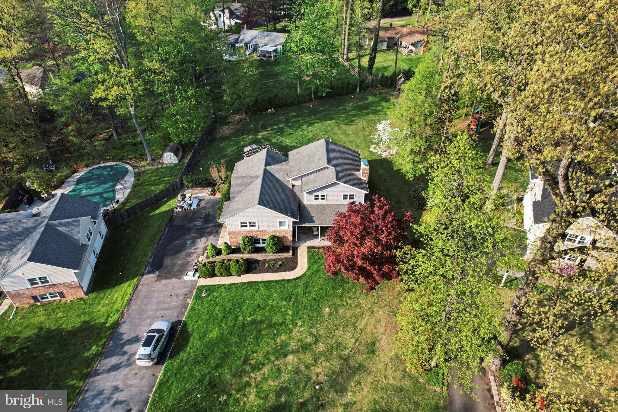 443 Woodcrest Road Wayne, PA 19087 - Photo 56 of 63 an aerial view of a house with garden space and street view