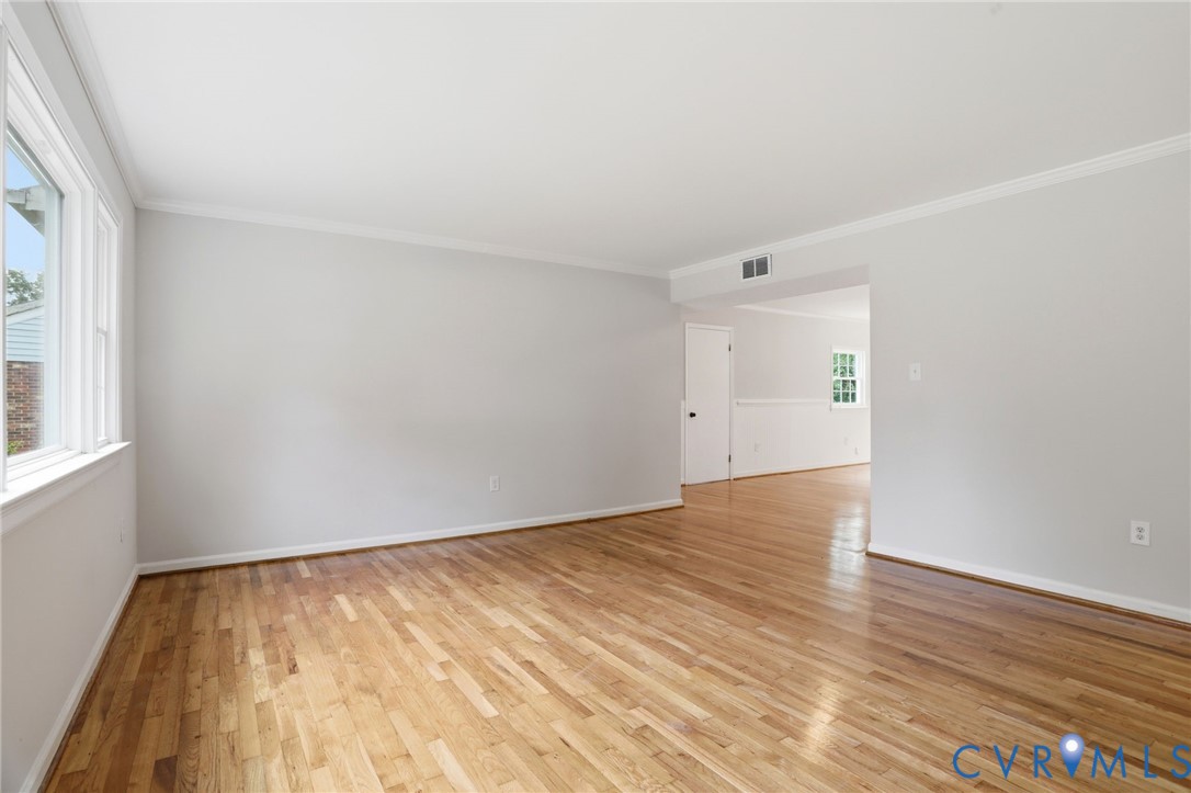 5301 Dalglish Road Richmond, VA 23223 - Photo 4 of 42 Hardwood flooring throughout a room with light gra