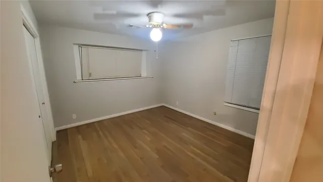 a bathroom with a sink toilet and mirror