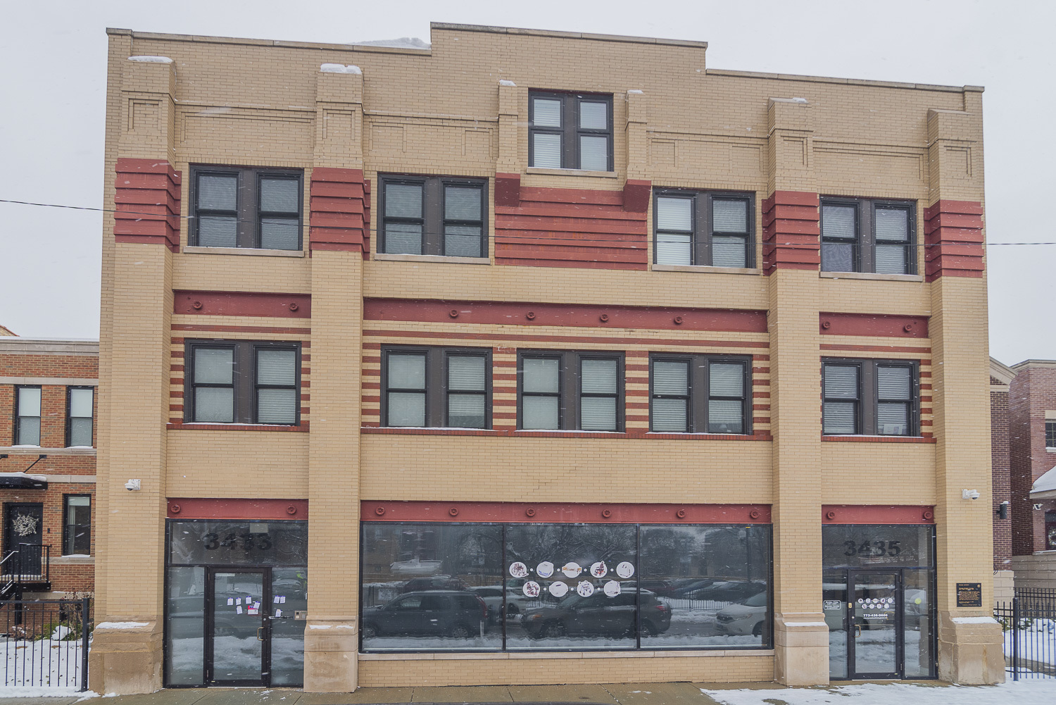 3433 South Indiana Avenue, Unit 301 Chicago, IL 60616 - Photo 1 of 12 a front view of a building with a glass door