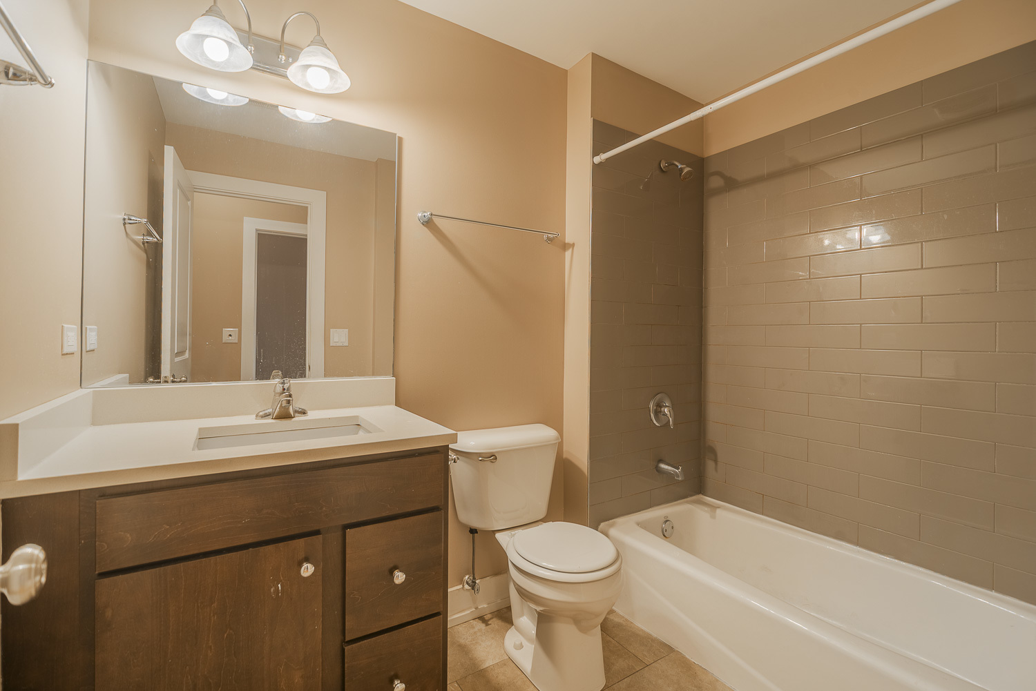 3433 South Indiana Avenue, Unit 301 Chicago, IL 60616 - Photo 11 of 12 a bathroom with a sink a toilet and shower