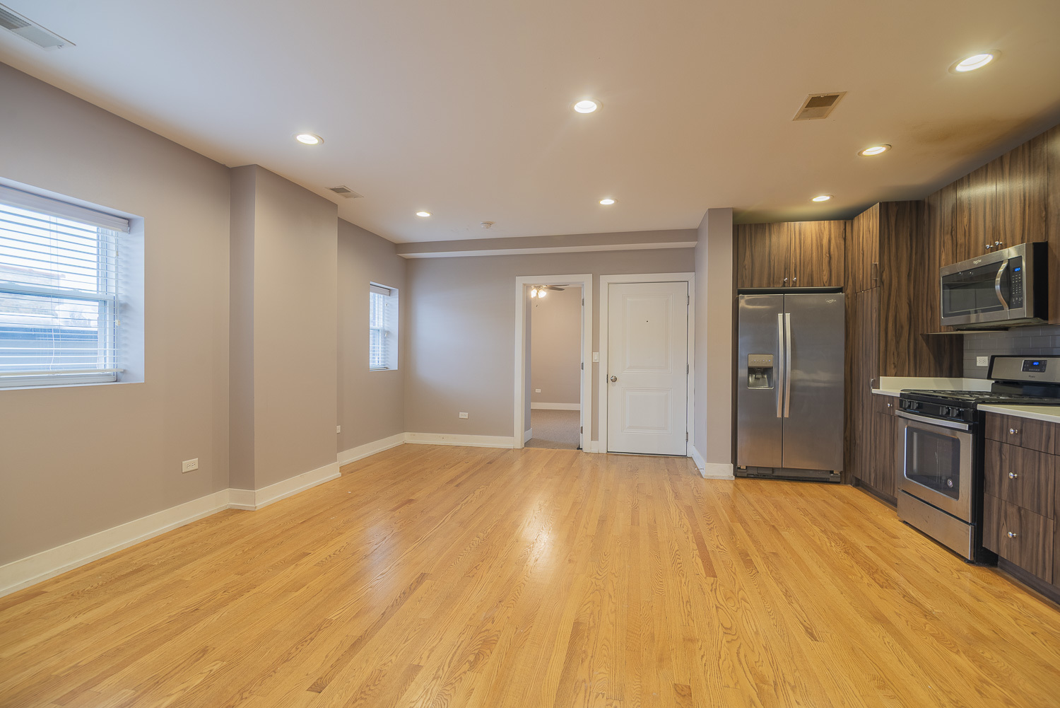 3433 South Indiana Avenue, Unit 301 Chicago, IL 60616 - Photo 3 of 12 a view of a kitchen with a sink and a refrigerator