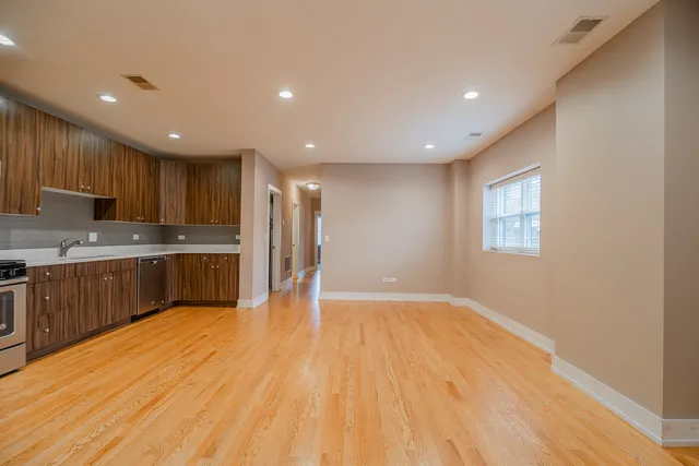a view of kitchen with wooden floor