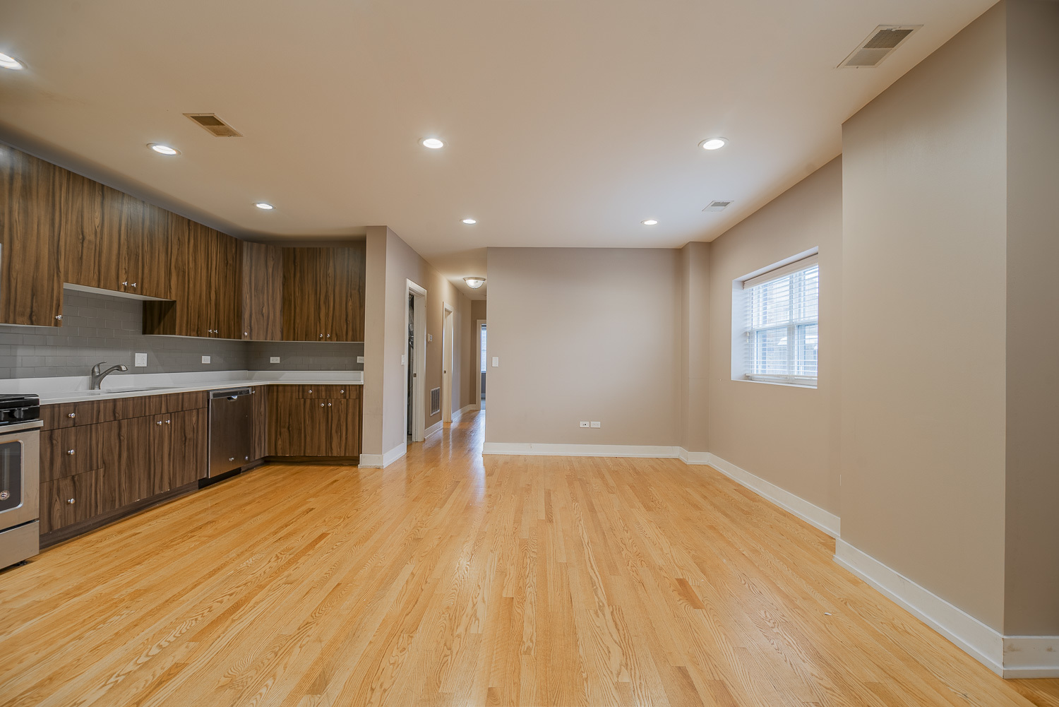 3433 South Indiana Avenue, Unit 301 Chicago, IL 60616 - Photo 4 of 12 a view of kitchen with wooden floor