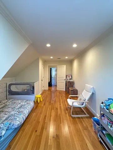 a bed room with a bed and furniture