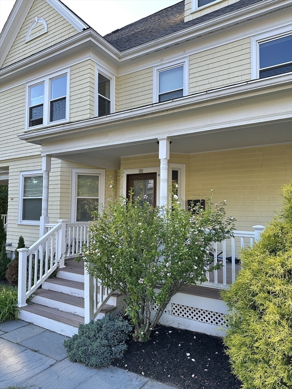 191 Newtonville Avenue, Unit 191 Newton, MA 02458 - Photo 38 of 41 a view of a house with a yard and plants