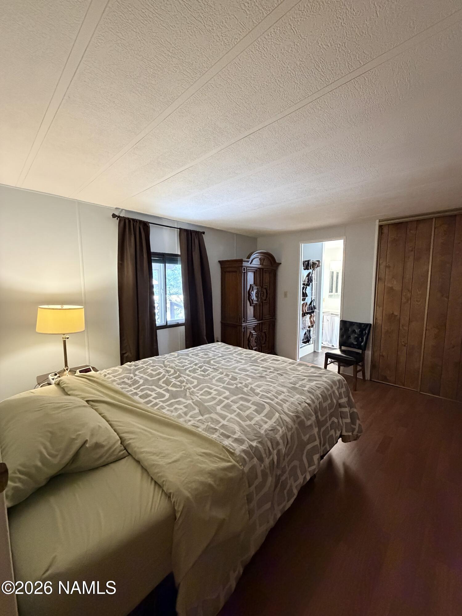 2401 West Rte 66, Unit 43 Flagstaff, AZ 86001 - Photo 2 of 20 primary bedroom w/ en suite bath