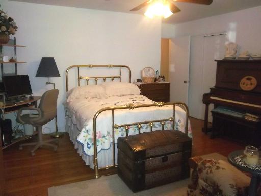 18328 Riegel Road Homewood, IL 60430 - Photo 7 of 14 a bedroom with a bed and a window