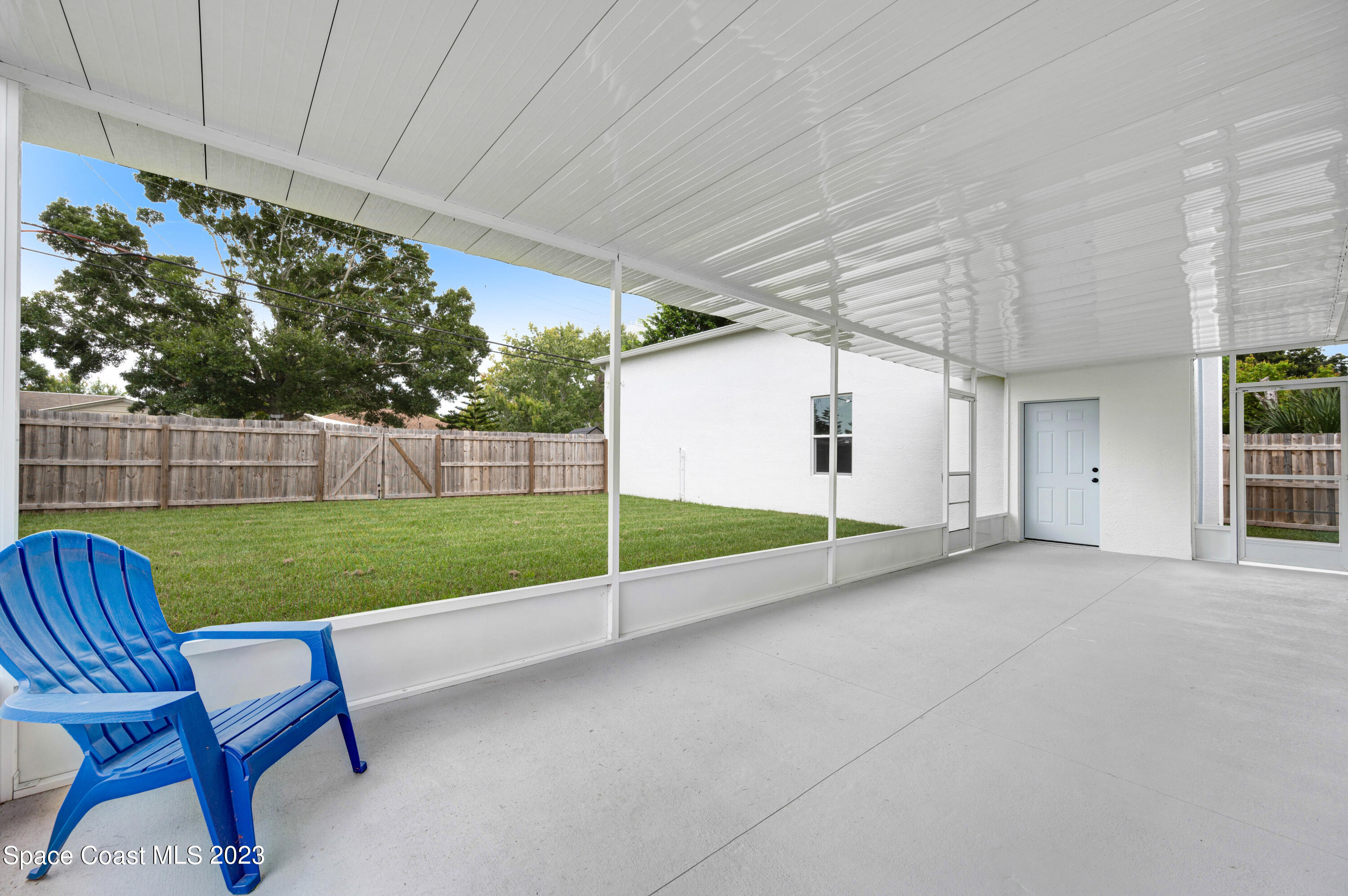1720 Elizabeth Street Melbourne, FL 32901 - Photo 22 of 33 a view of a porch with furniture and garden