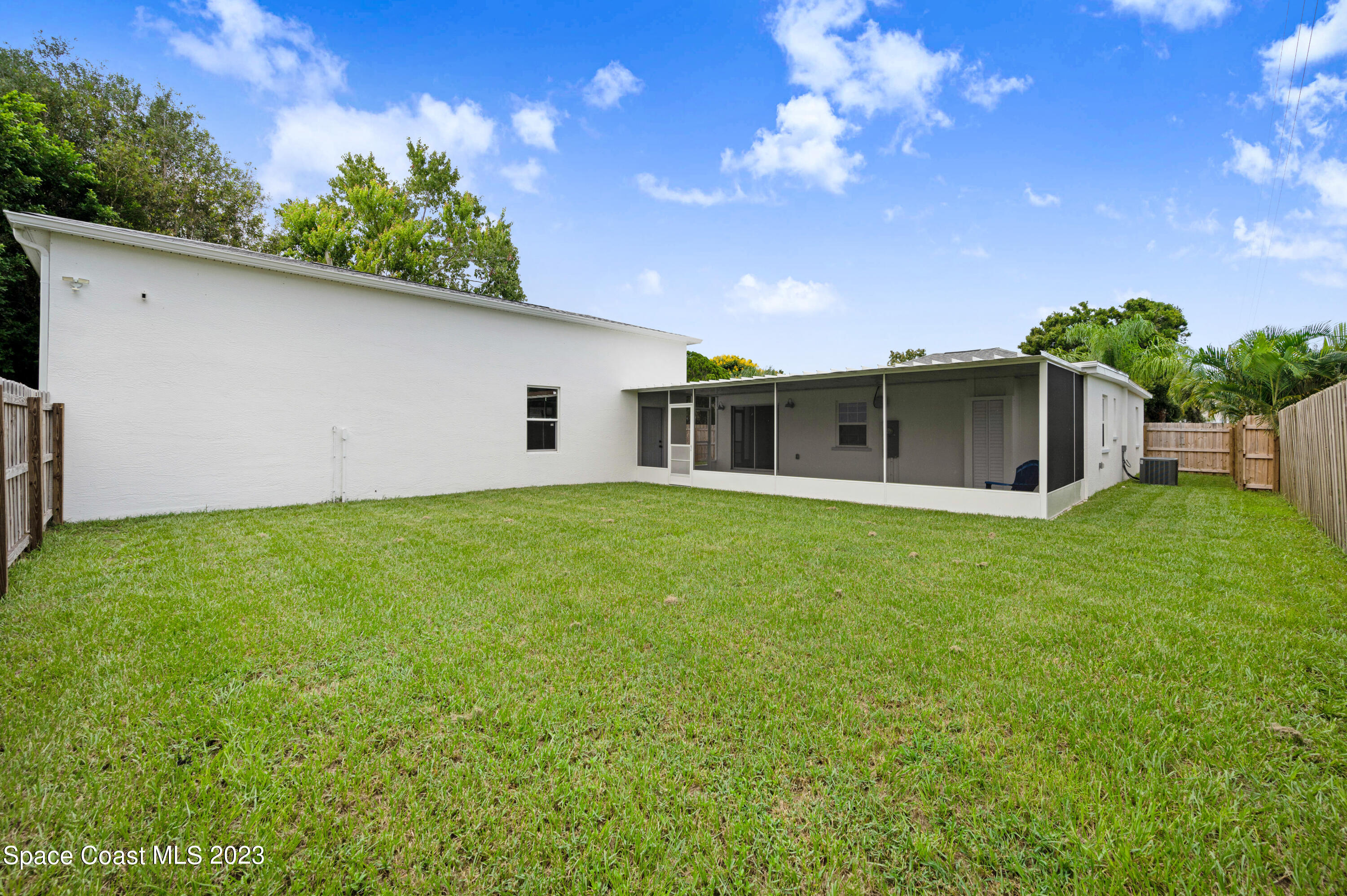 1720 Elizabeth Street Melbourne, FL 32901 - Photo 29 of 33 a view of a house with a backyard
