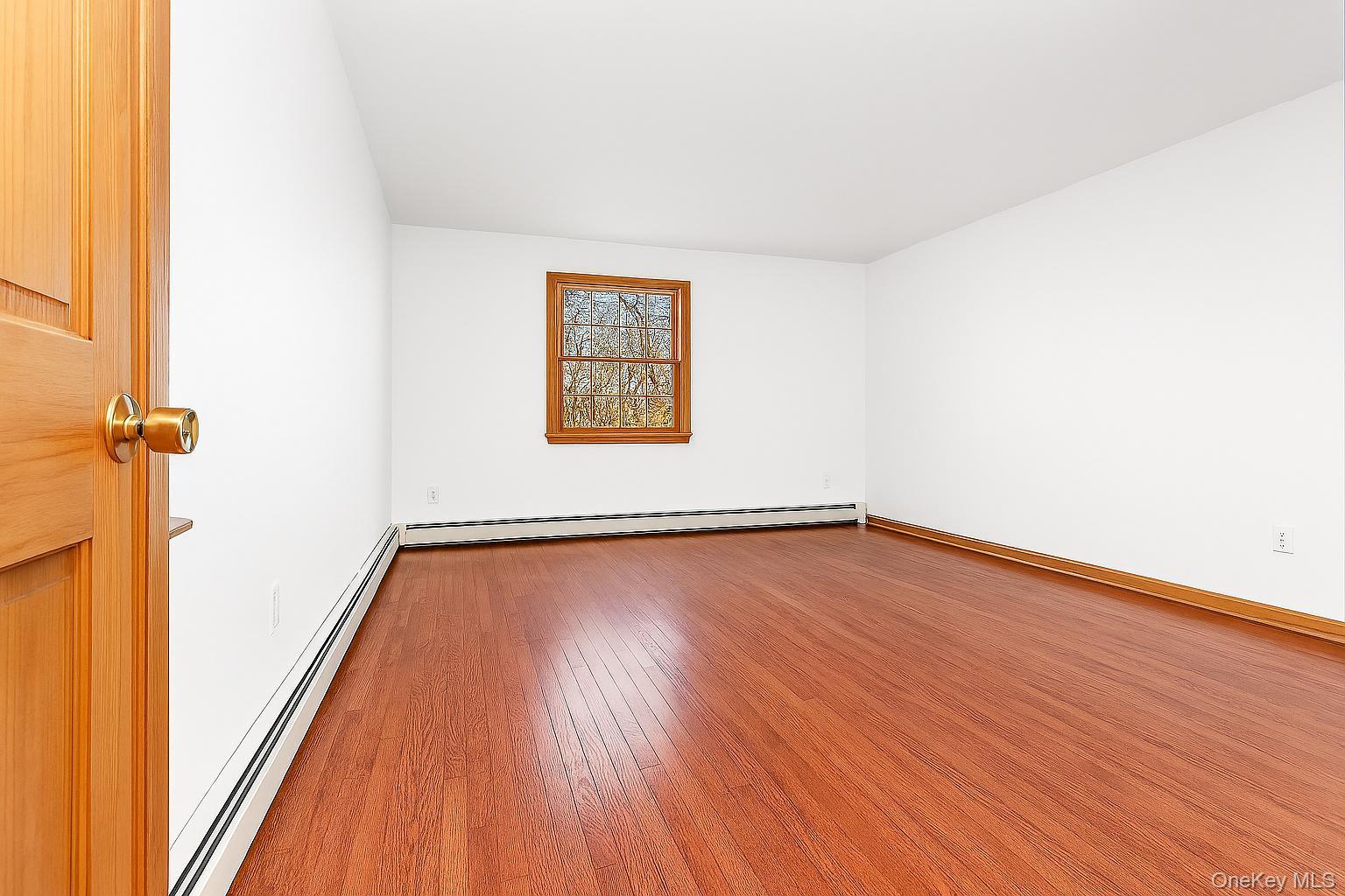 63 Farview Road Carmel, NY 10512 - Photo 23 of 38 a view of a room with wooden floor and window