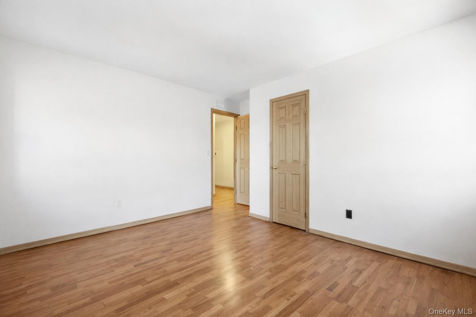 63 Farview Road Carmel, NY 10512 - Photo 24 of 38 a view of an empty room with wooden floor and closet