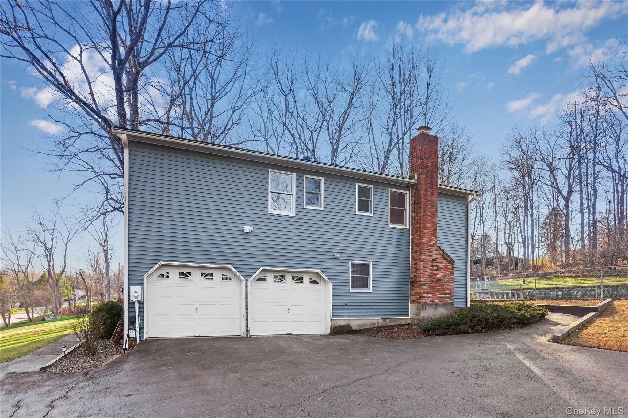 63 Farview Road Carmel, NY 10512 - Photo 28 of 38 a view of a house with a yard and tree s
