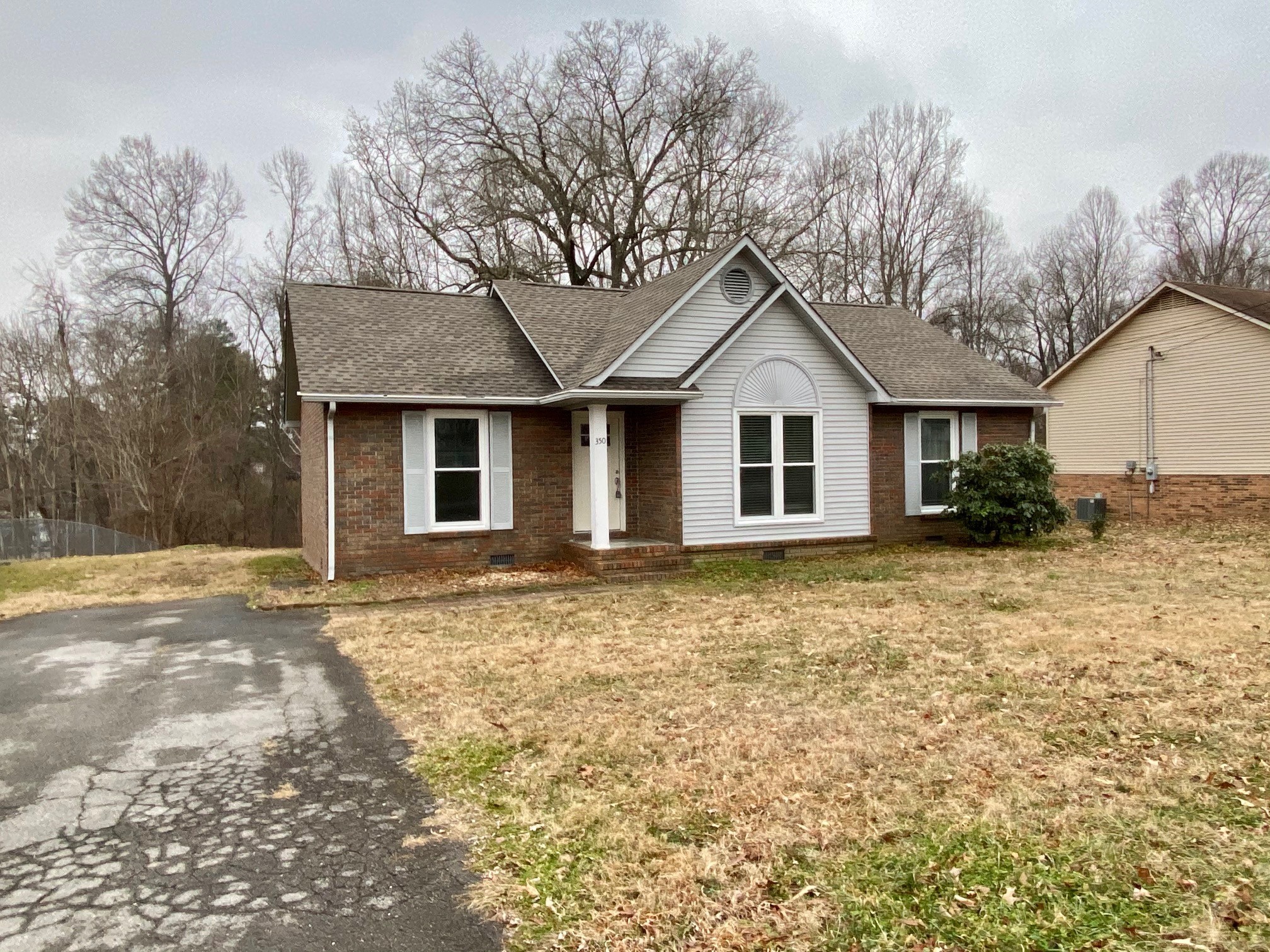 350 State Street Cookeville, TN 38501 - Photo 19 of 21 a front view of a house with garden