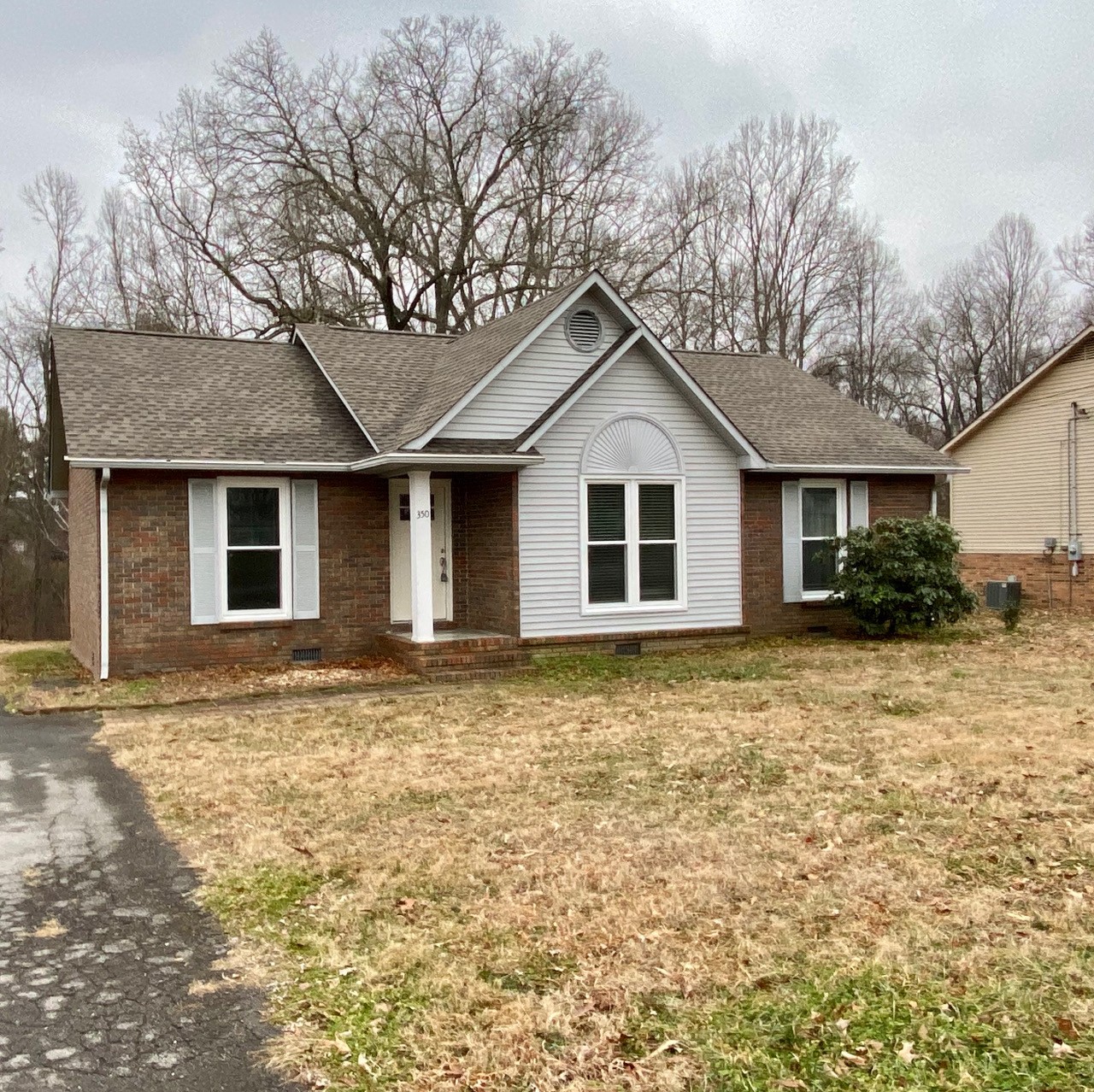 350 State Street Cookeville, TN 38501 - Photo 21 of 21 a front view of a house with a garden