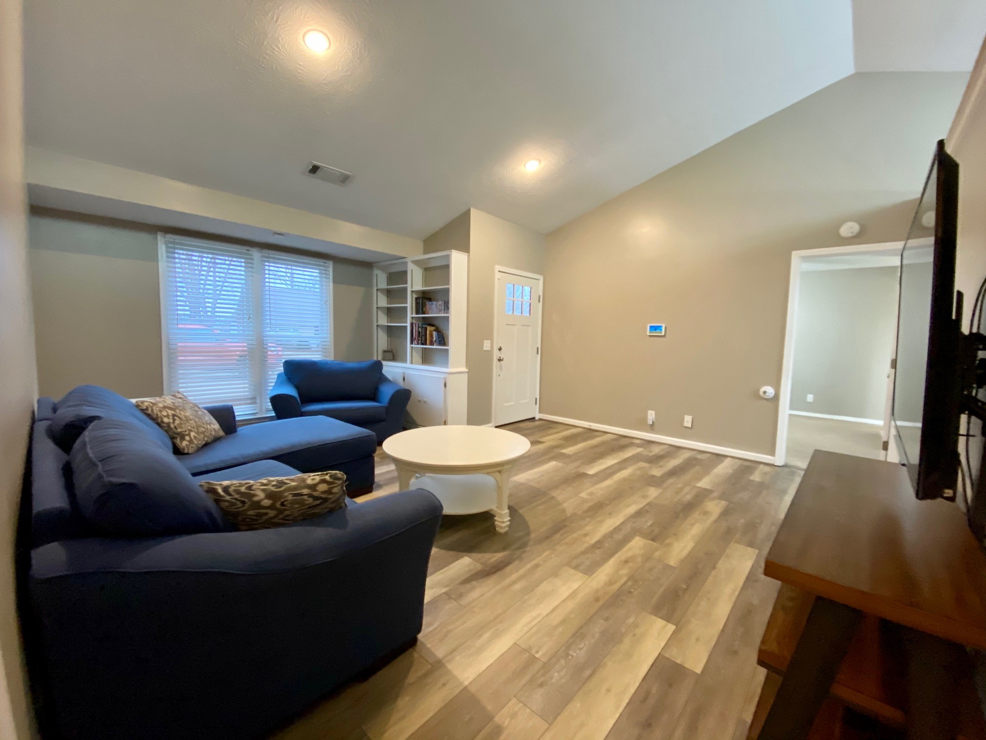 350 State Street Cookeville, TN 38501 - Photo 7 of 21 a living room with furniture and a flat screen tv