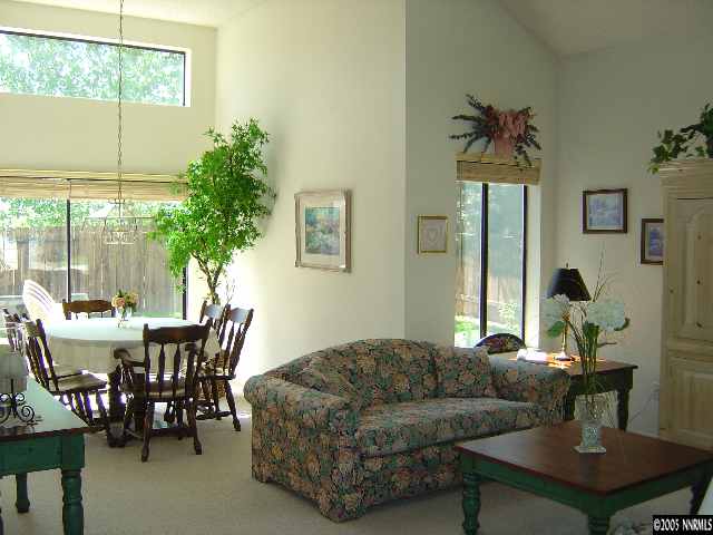 1797 Fox Run Road Reno, NV 89523 - Photo 5 of 9 a living room with furniture and a potted plant