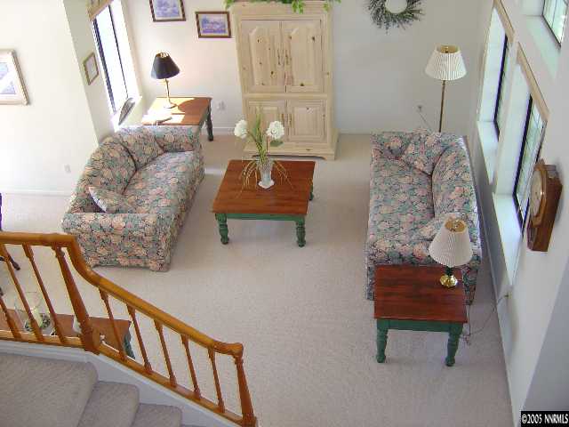 1797 Fox Run Road Reno, NV 89523 - Photo 6 of 9 a living room with furniture and a painting on the wall