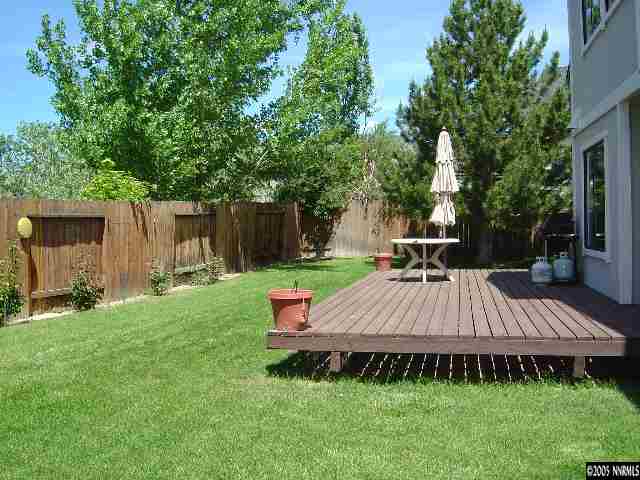1797 Fox Run Road Reno, NV 89523 - Photo 9 of 9 a view of a wooden deck and yard