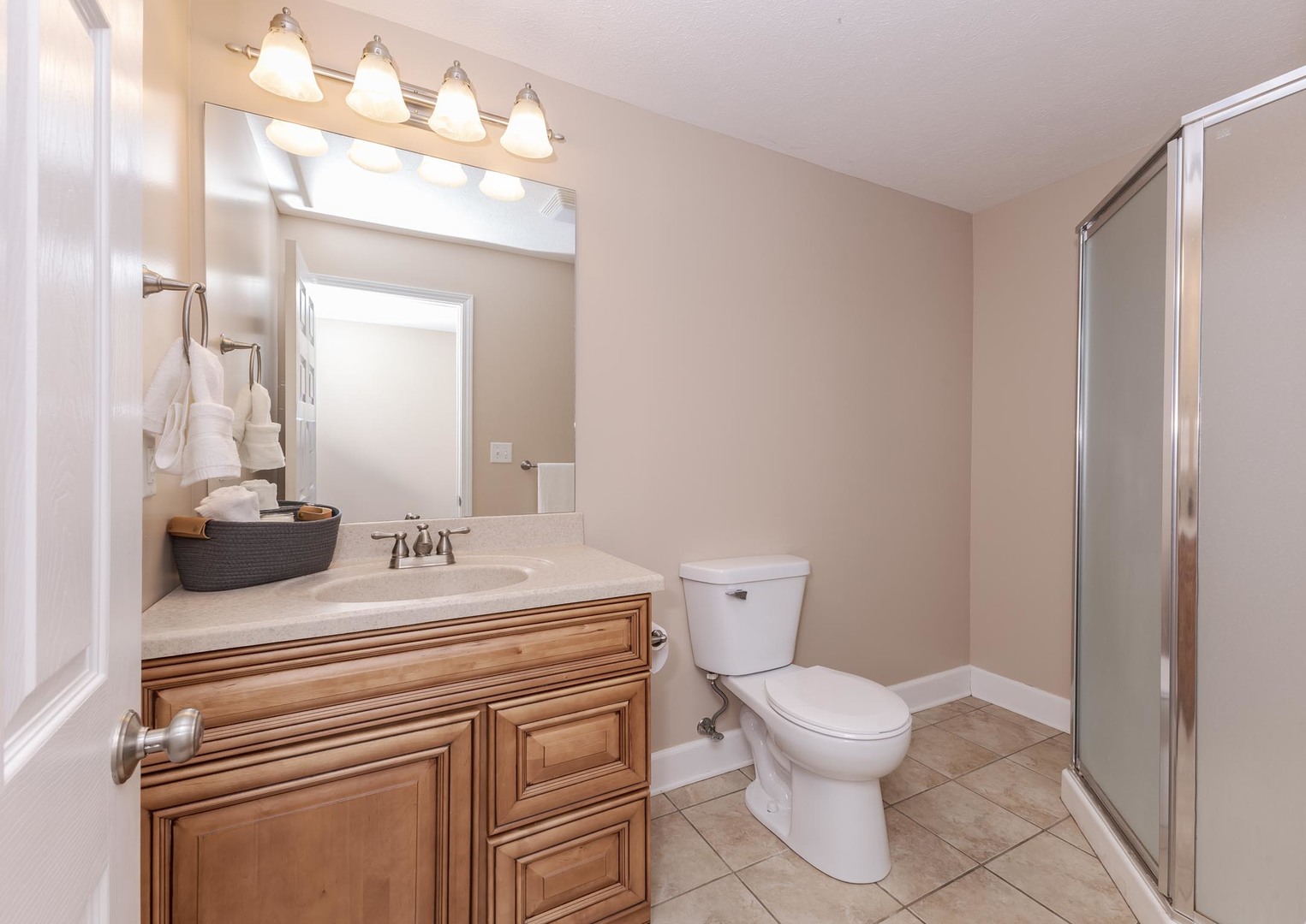 2409 Sanford Lane Normal, IL 61761 - Photo 35 of 62 a bathroom with a sink toilet vanity and granite
