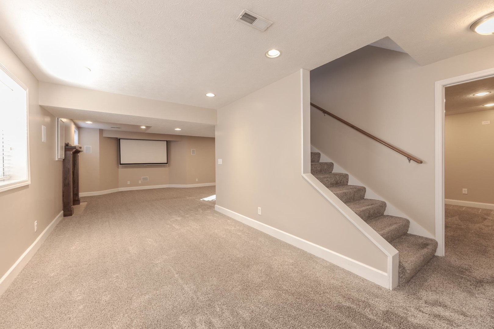 2409 Sanford Lane Normal, IL 61761 - Photo 37 of 62 a view of an empty room with stairs and furniture