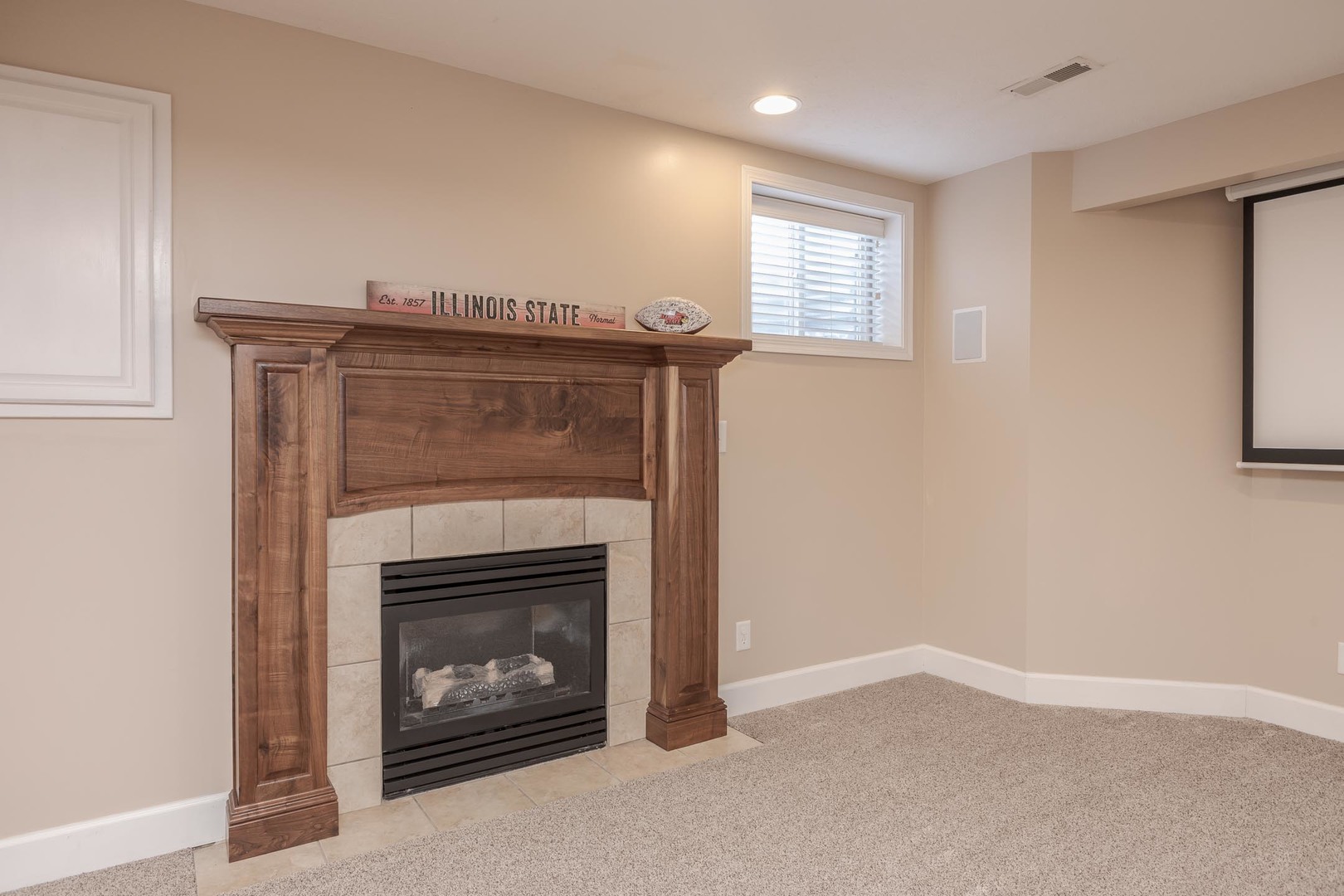 2409 Sanford Lane Normal, IL 61761 - Photo 38 of 62 an empty room with windows and fireplace