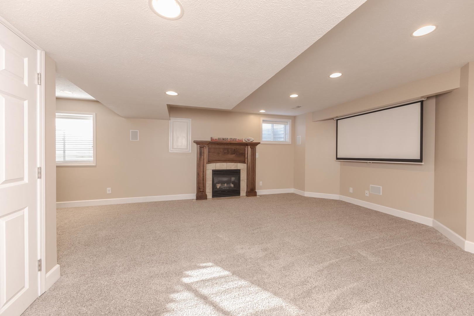 2409 Sanford Lane Normal, IL 61761 - Photo 39 of 62 a view of an empty room with a fireplace