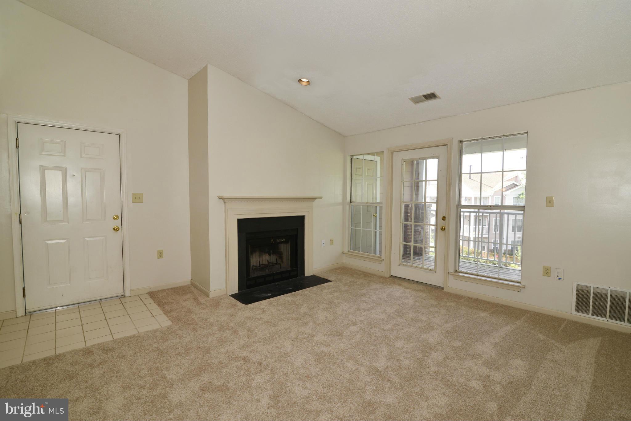21014 Timber Ridge Terrace, Unit 301 Ashburn, VA 20147 - Photo 2 of 17 Living Room