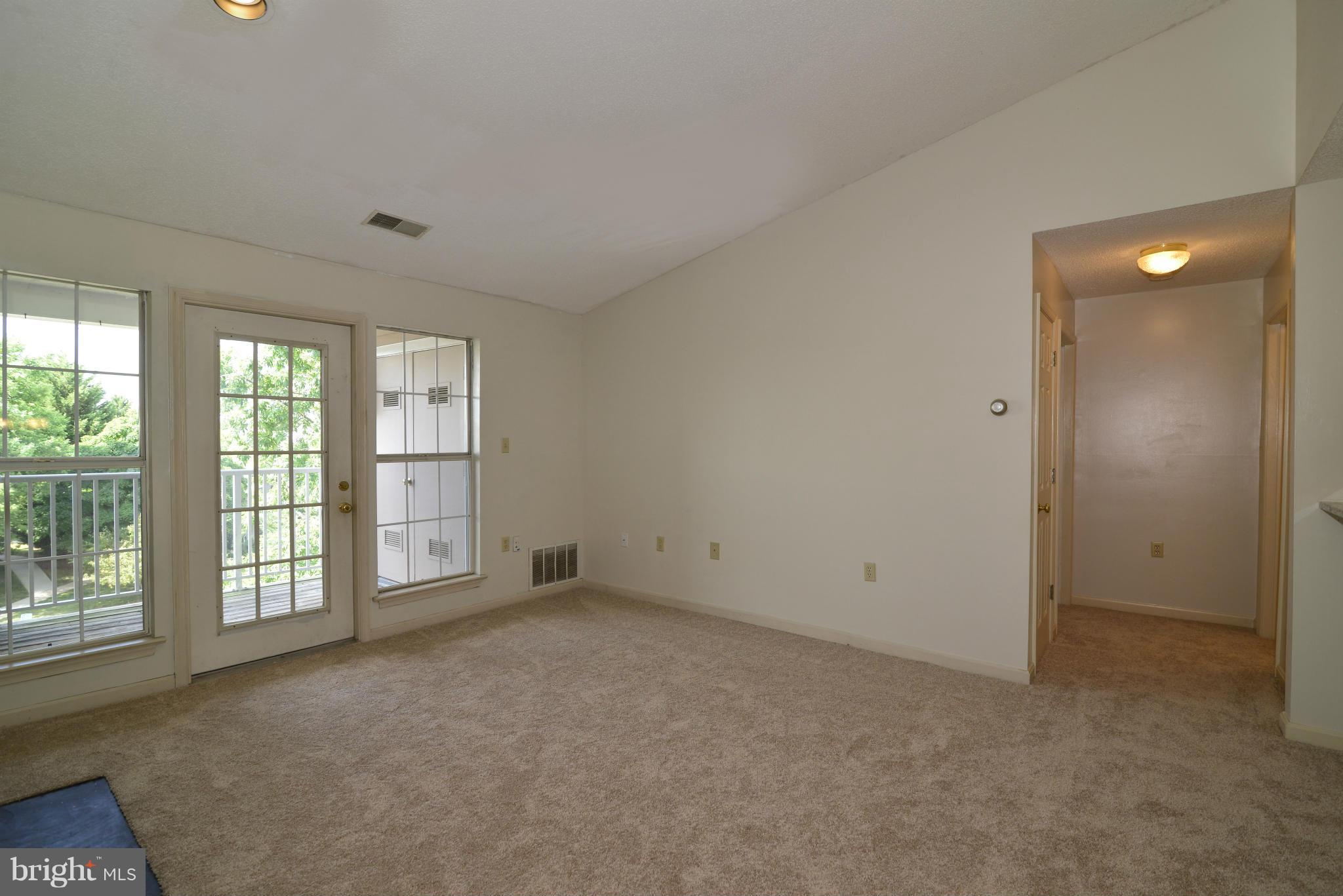 21014 Timber Ridge Terrace, Unit 301 Ashburn, VA 20147 - Photo 3 of 17 Living Room