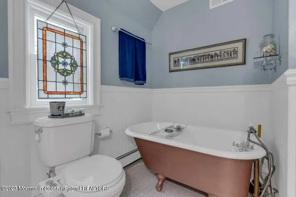a bathroom with a sink and a toilet