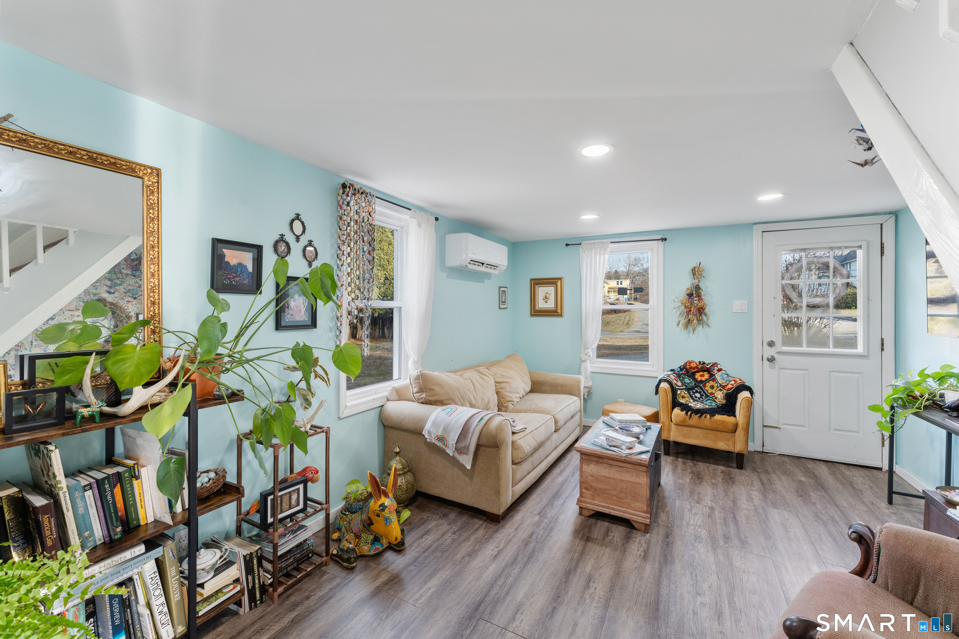 92 Hunters Avenue Norwich, CT 06380 - Photo 17 of 36 a living room with furniture and a wooden floor