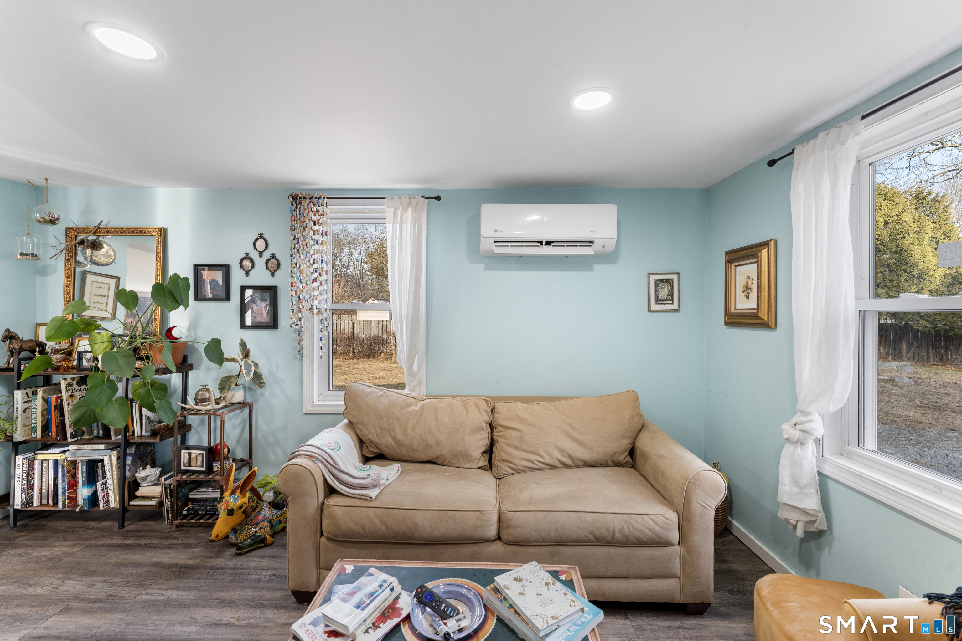 92 Hunters Avenue Norwich, CT 06380 - Photo 19 of 36 a living room with furniture and a window
