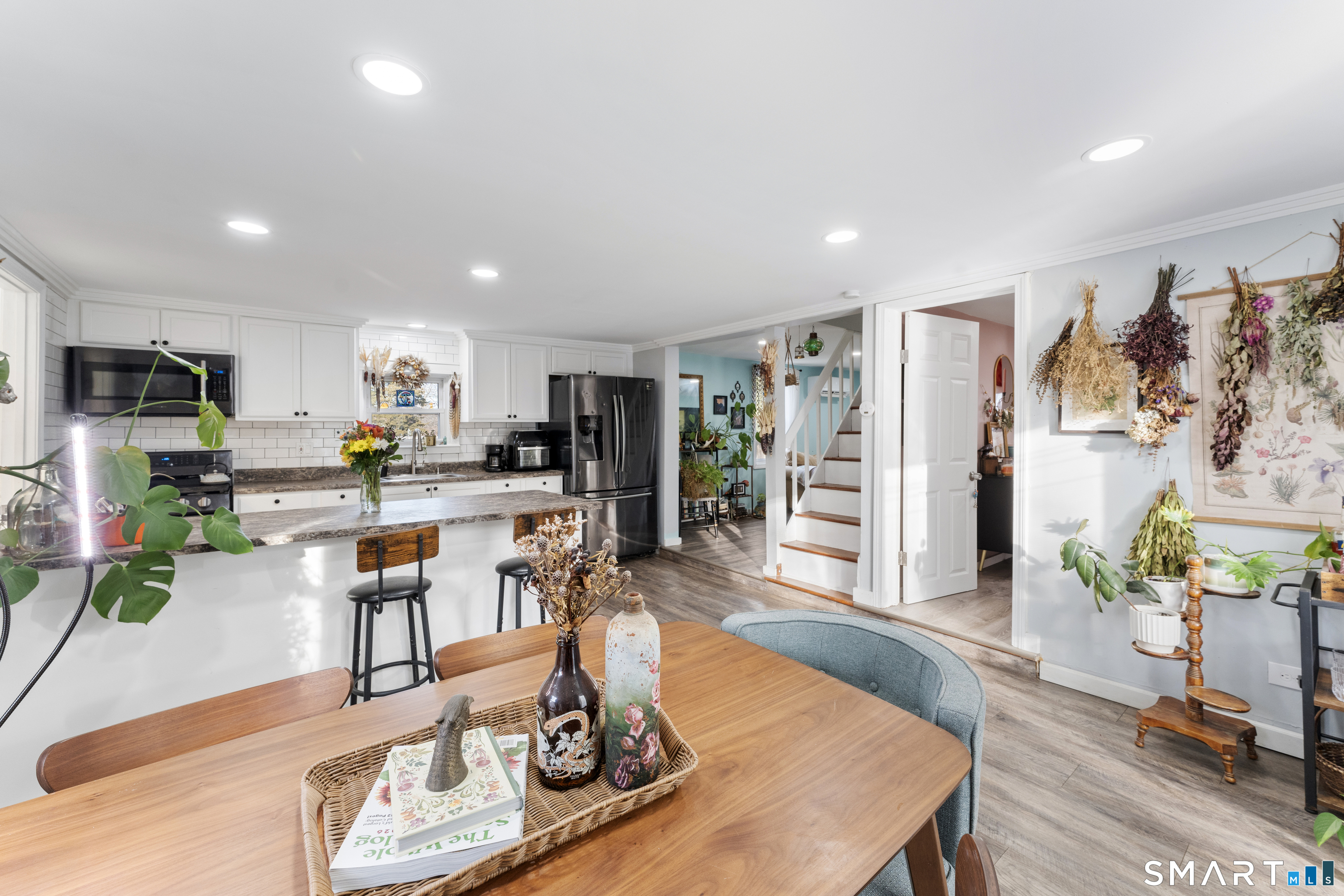 92 Hunters Avenue Norwich, CT 06380 - Photo 24 of 36 a living room with furniture and wooden floor
