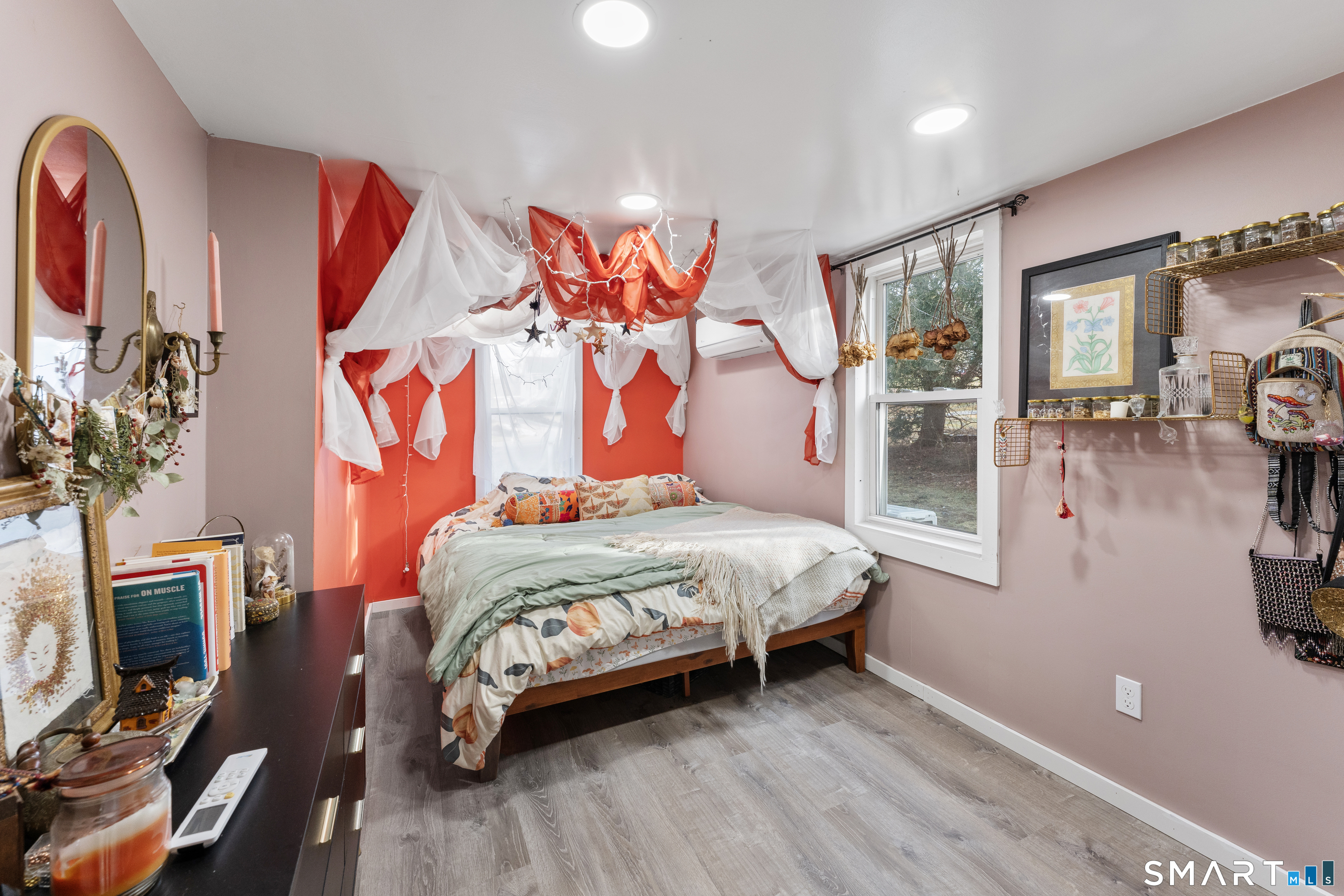 92 Hunters Avenue Norwich, CT 06380 - Photo 28 of 36 a bedroom with a bed and a flat screen tv