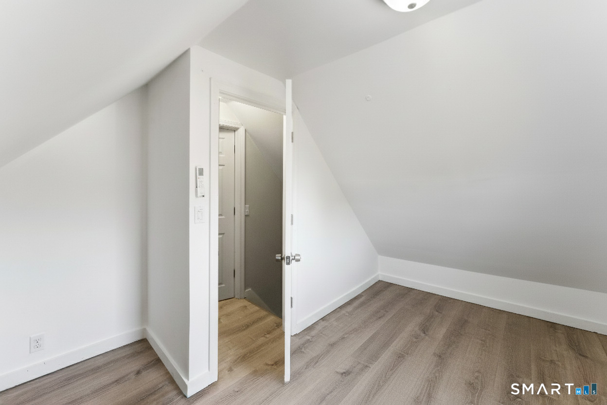 92 Hunters Avenue Norwich, CT 06380 - Photo 34 of 36 wooden floor in an empty room