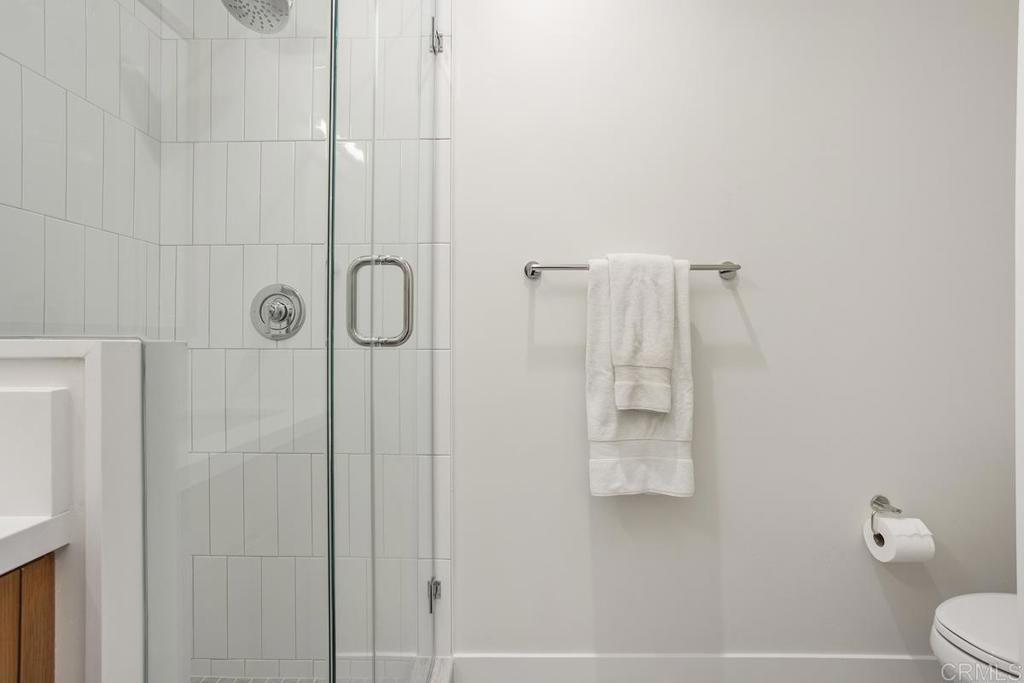 1756 Whaley Street Oceanside, CA 92054 - Photo 21 of 26 a bathroom with a shower