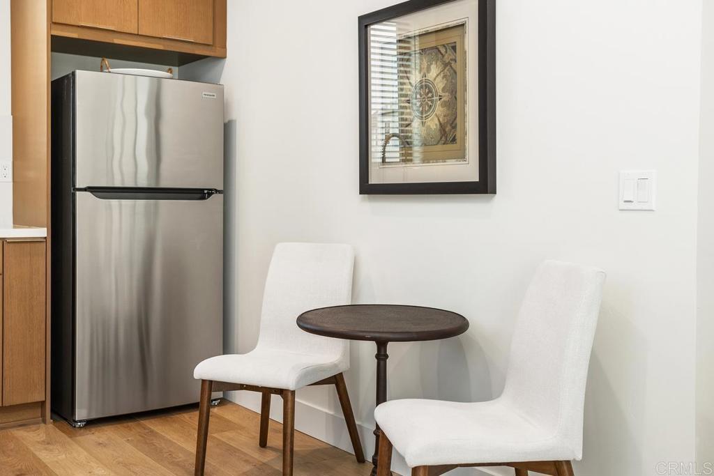 1756 Whaley Street Oceanside, CA 92054 - Photo 5 of 26 a view of a room with a table and a chair