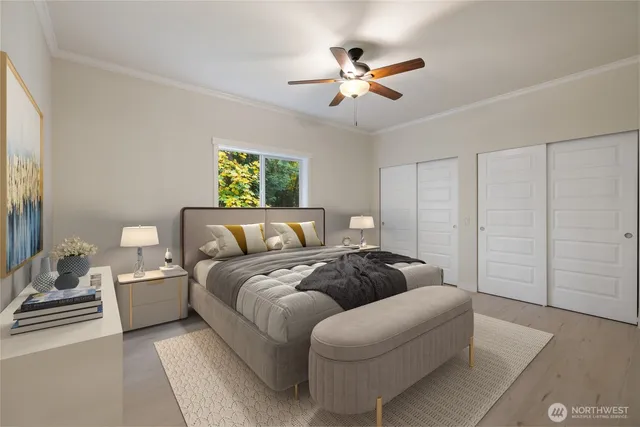 a living room with furniture and ceiling fan