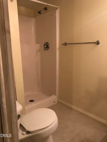 a kitchen with a stove and a cabinet