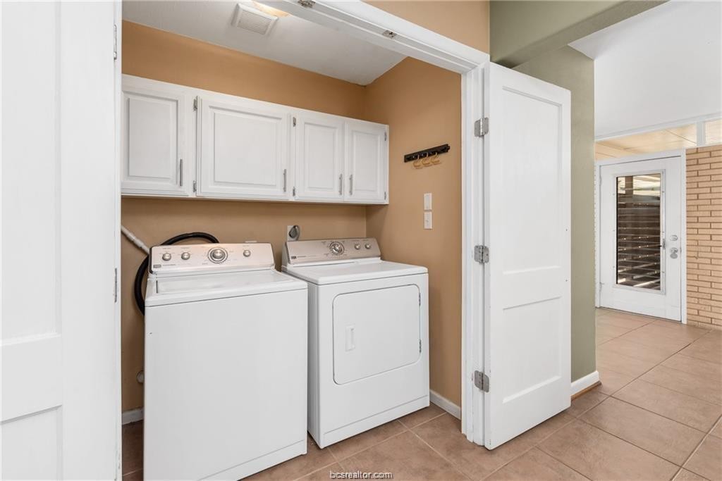 401 Helena Street Bryan, TX 77801 - Photo 14 of 21 a utility room with dryer and washer