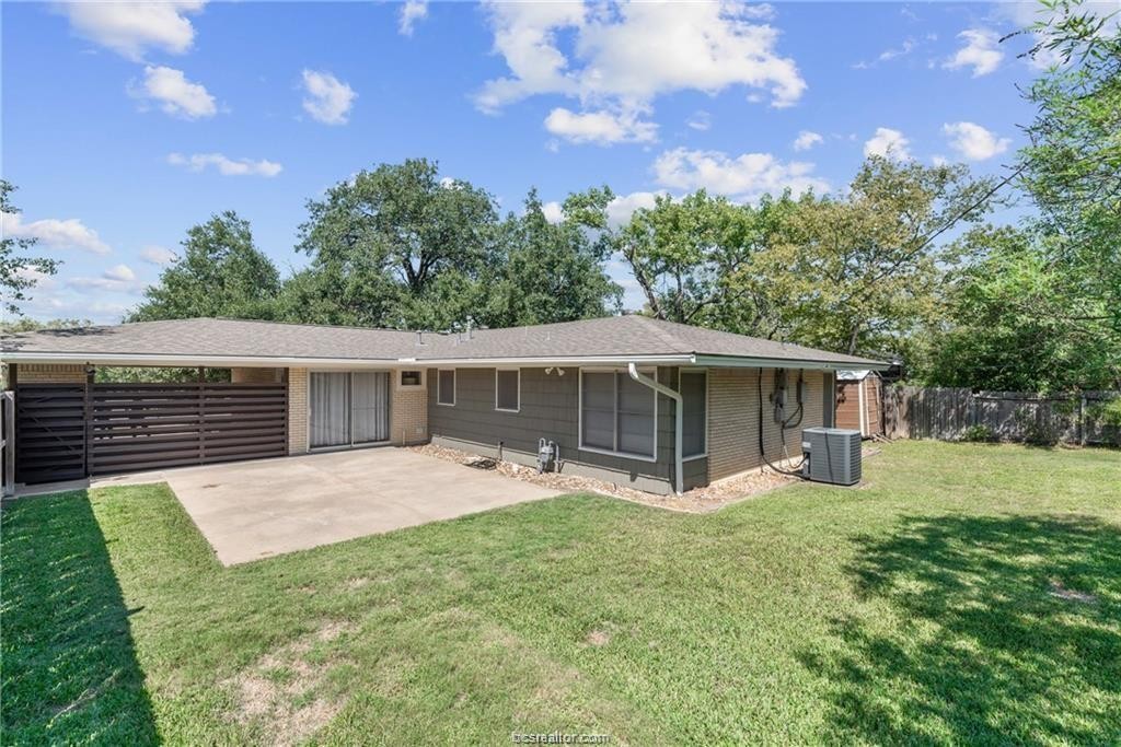 401 Helena Street Bryan, TX 77801 - Photo 20 of 21 a view of a house with backyard and sitting area