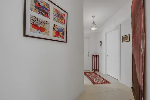 wooden floor with a close up view of a chandelier