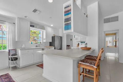 a kitchen that has a cabinets and a stove