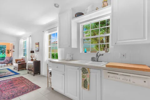 a view of a kitchen with a window
