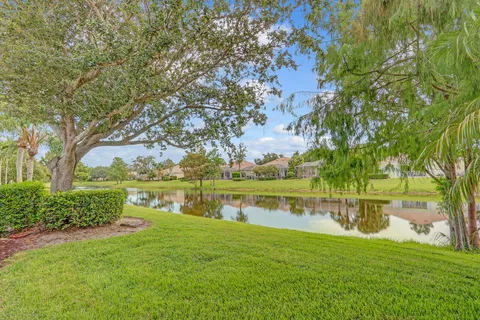 a view of a lake with a big yard
