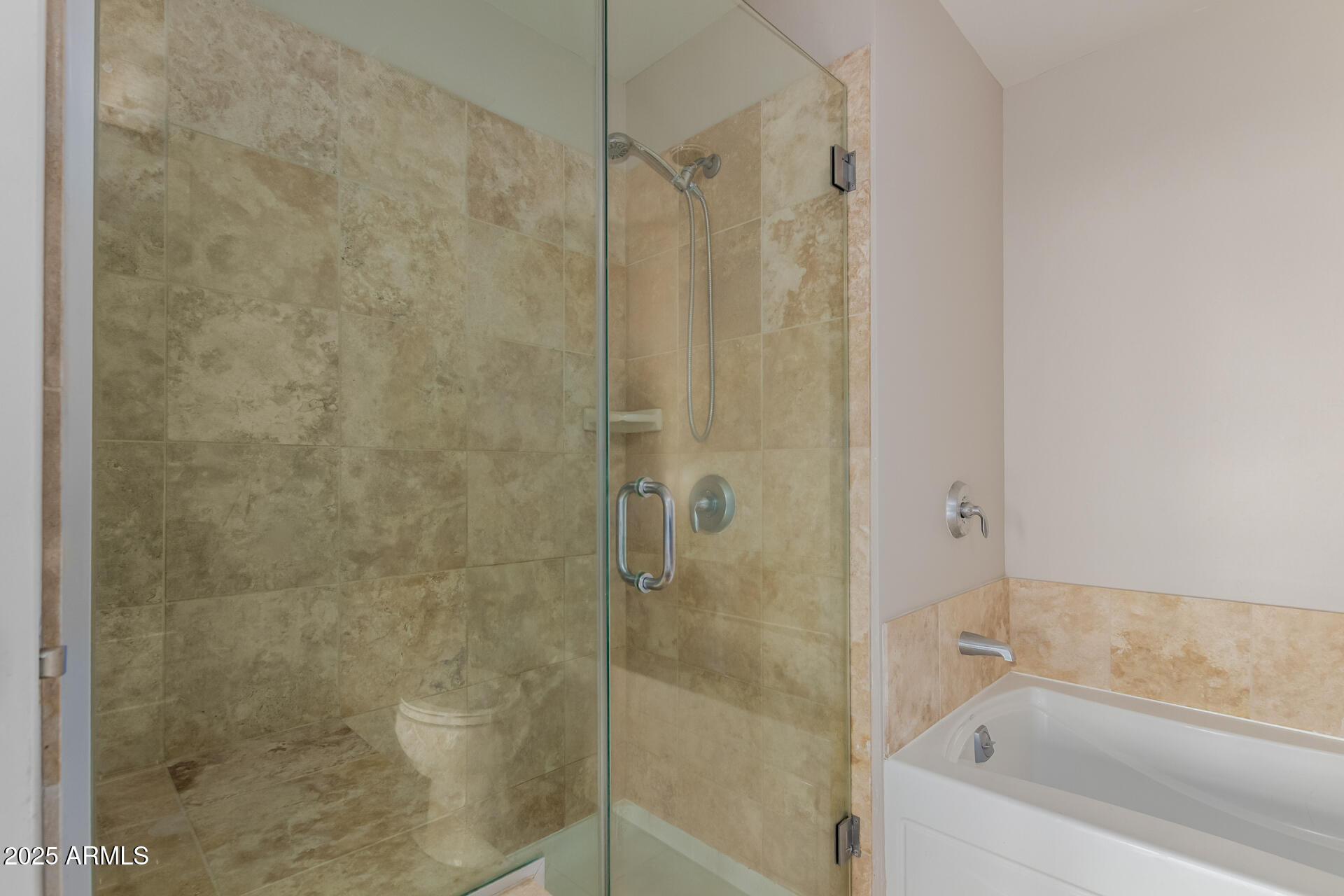 310 South 4th Street, Unit 1902 Phoenix, AZ 85004 - Photo 19 of 37 a bathroom with a bathtub and a shower