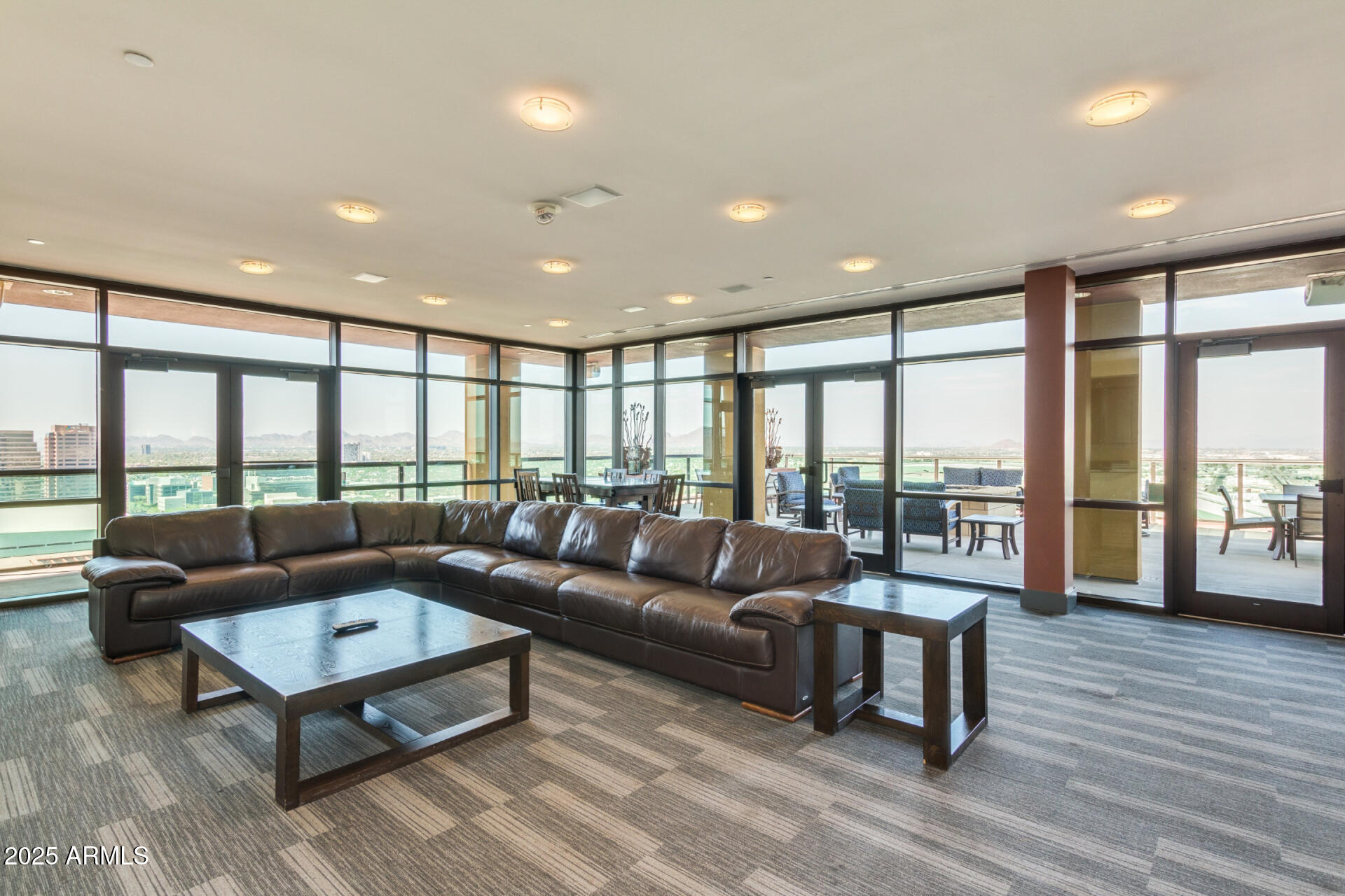 310 South 4th Street, Unit 1902 Phoenix, AZ 85004 - Photo 25 of 37 a living room with furniture and a large window
