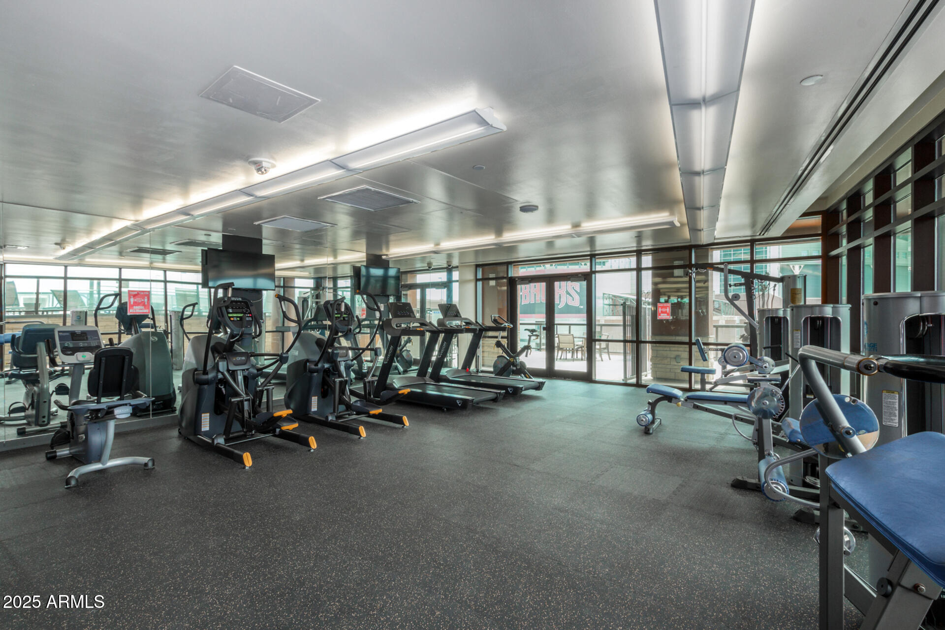 310 South 4th Street, Unit 1902 Phoenix, AZ 85004 - Photo 27 of 37 a view of a room with gym equipment