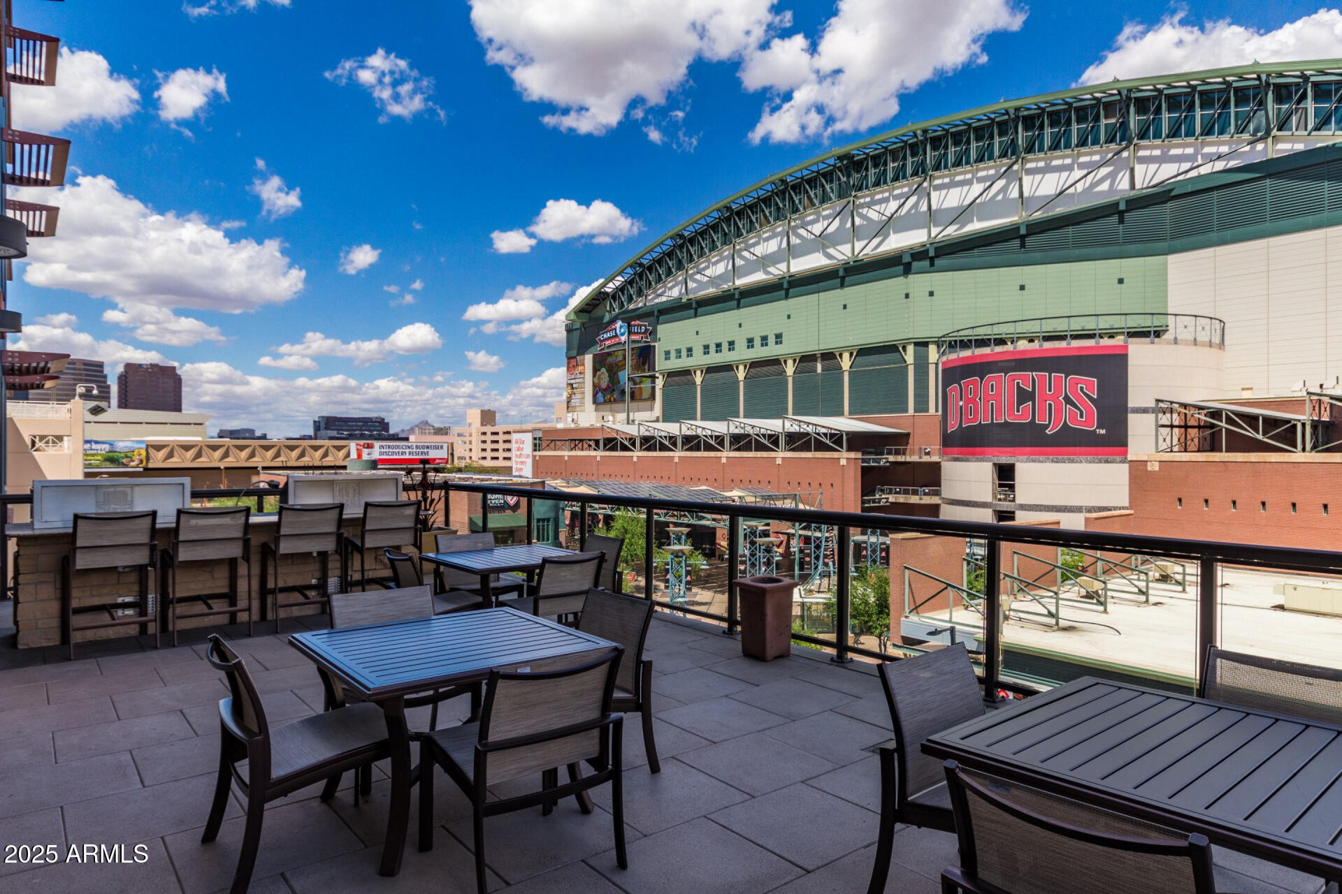 310 South 4th Street, Unit 1902 Phoenix, AZ 85004 - Photo 29 of 37 a view of a chairs and table in the terrace