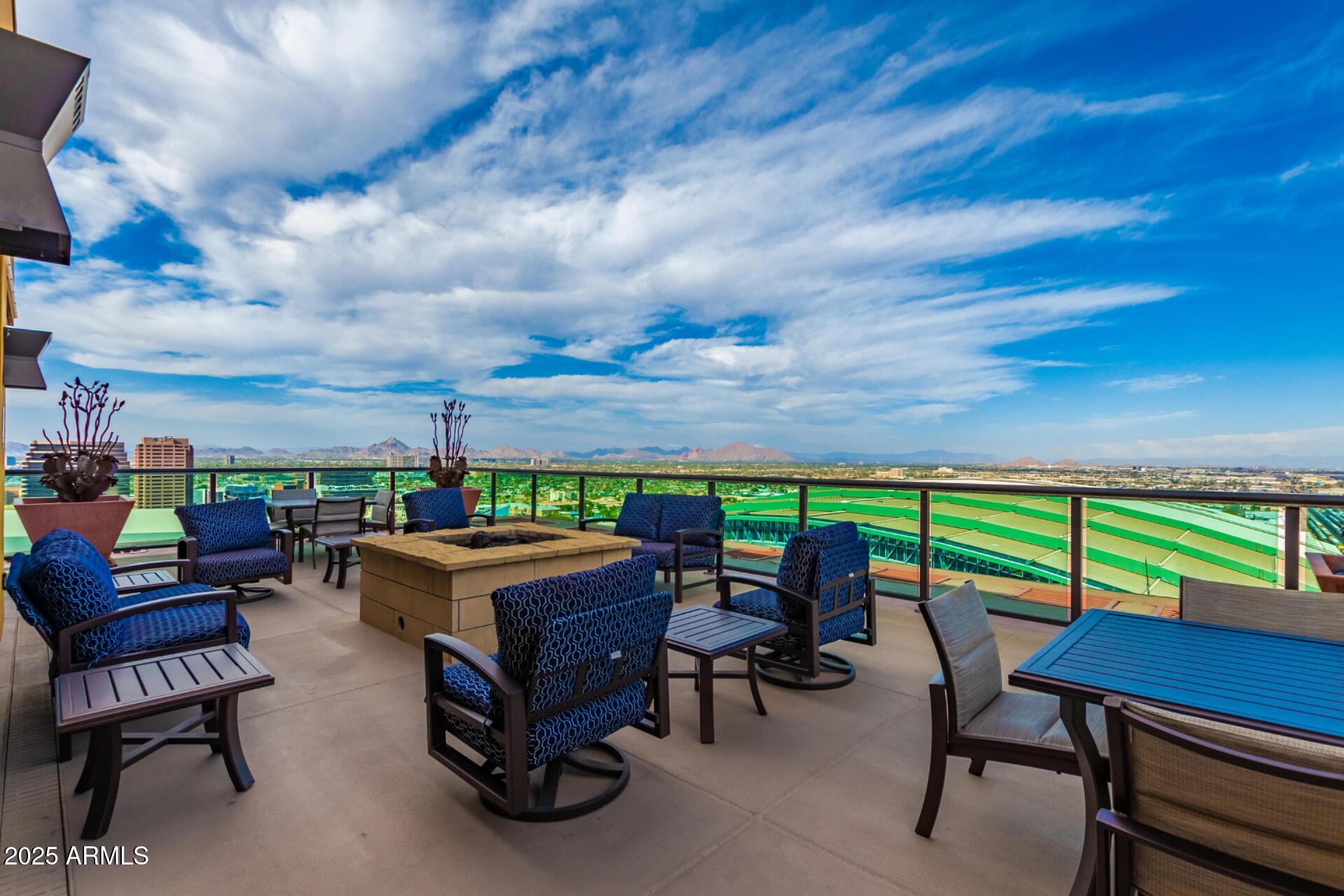 310 South 4th Street, Unit 1902 Phoenix, AZ 85004 - Photo 35 of 37 a view of a chairs and table in the patio